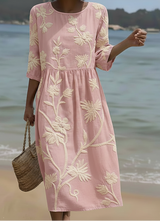 Phoebe | Midi dress with a floral and botanical print