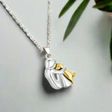 Emma Woman & Dog Embrace Necklace