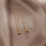 Tassel earrings in the shape of a teardrop