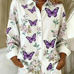 Butterfly and floral print button-up blouse | Anne London