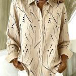 Khaki and black abstract patterned button-up blouse | Anne London